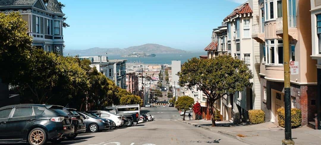 A street in san francisco with cars parked on it.