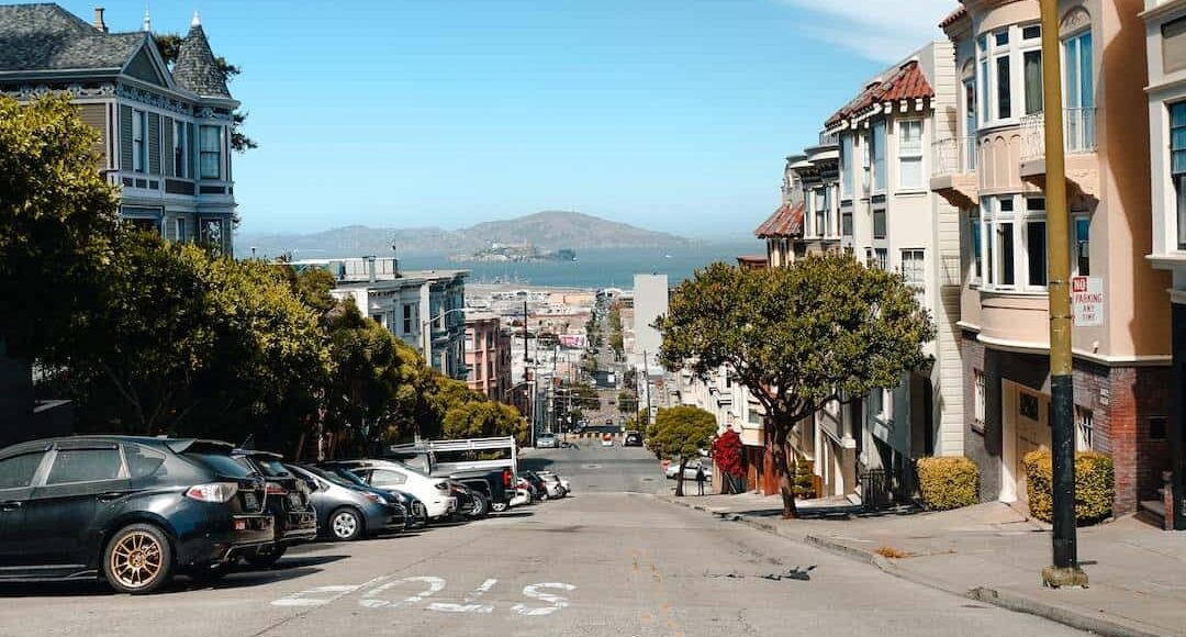 A street in san francisco with cars parked on it.