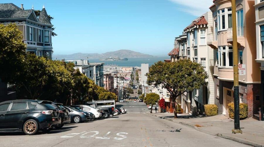 A street in san francisco with cars parked on it.